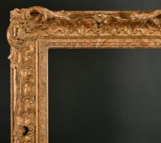 20th Century English School. A Gilt Composition Frame, with swept and pierced centres and corners,