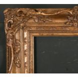 20th Century English School. A Gilt Composition Frame, with swept centres and corners, rebate 14"