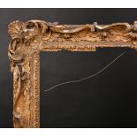 18th Century English School. A Carved Giltwood Frame, with swept and pierced centres and corners,