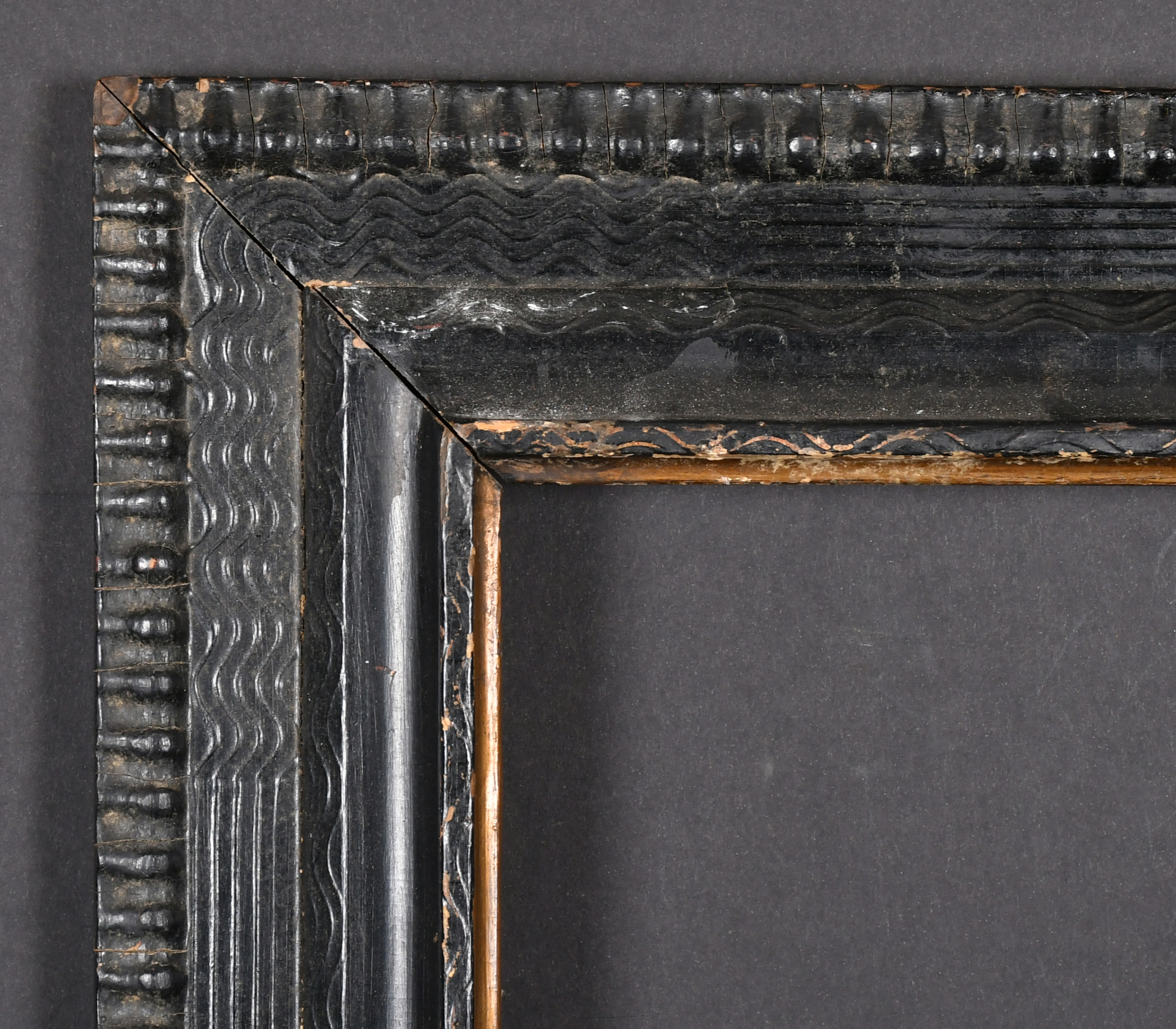 20th Century English School. A Black Painted Frame with a gilt inner edge, rebate 18" x 13" (45.7