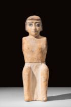 LARGE EGYPTIAN WOODEN FIGURE OF A BOATMAN
