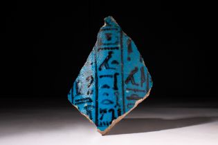 EGYPTIAN FAIENCE FRAGMENT FROM A FUNERARY VASE