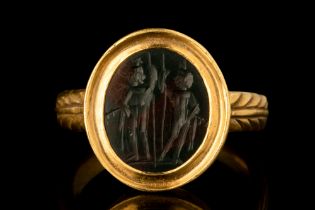 ROMAN BLOODSTONE INTAGLIO WITH DIOSCURI IN GOLD RING