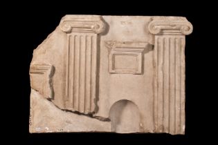 EGYPTIAN RELIEF FRAGMENT FROM A SARCOPHAGUS WITH 'CLASSIC FAÇADE'