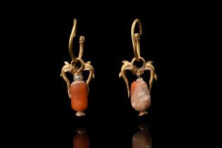 MATCHED PAIR OF GREEK HELLENISTIC GOLD EARRINGS WITH DOLPHINS