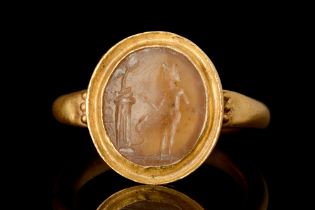 ROMAN JASPER OR AGATE INTAGLIO WITH GOD NEAR AN ALTAR IN GOLD RING