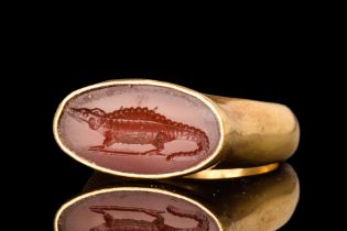 PTOLEMAIC GOLD RING WITHG CARNELIAN CROCODILE INTAGLIO