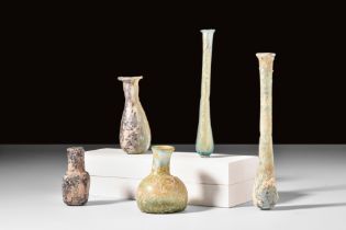 COLLECTION OF FIVE ROMAN GLASS BOTTLES