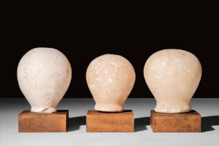 GROUP OF THREE NEAR EASTERN MARBLE MACES