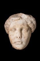 ROMAN MARBLE HEAD OF A FEMALE