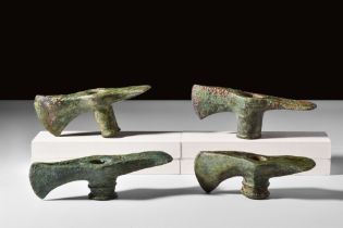 BRONZE AGE BRONZE GROUP OF FOUR AXE HEADS