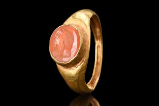 ROMAN GOLD RING WITH CARNELIAN JUPITER PORTRAIT INTAGLIO