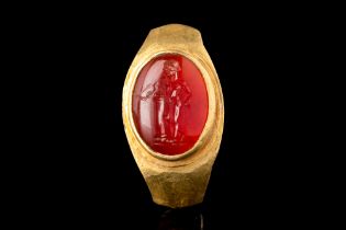 ROMAN GOLD RING WITH CARNELIAN INTAGLIO WITH GOD APOLLO