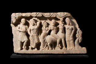 GANDHARAN SCHIST PANEL WITH BACCHANALIAN SCENE