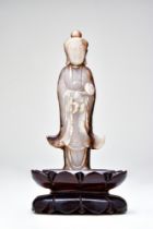 JADE FIGURE AND WOODEN STAND