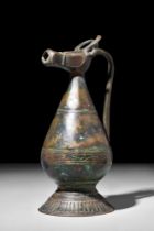 KHORASAN BRONZE EWER WITH ZOOMORPHIC SPOUT