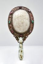 CHINESE CARVED JADE MIRROR BEJEWELED AND MOUNTED ON BRONZE