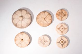 COLLECTION OF SEVEN FAIENCE ROSETTE INLAYS