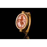 LATE ROMAN GOLD RING WITH INTAGLIO DEPICTING A SATYR