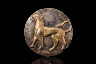IRON AGE SILVER GILDED APPLIQUE DEPICTING A ROARING LION