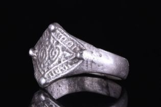 MEDIEVAL SILVER DECORATED RING WITH DOUBLE SPIRALS IN A FRAME