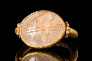 HOLY LANDS SILVER-GILT RING WITH ROCK CRYSTAL INTAGLIO WITH ARAMAIC INSCRIPTION