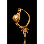 MASSIVE ROMAN GOLD UMBO EARRING - 22 GRAMS