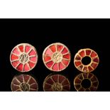 THREE MEROVINGIAN INLAID DISC BROOCHES