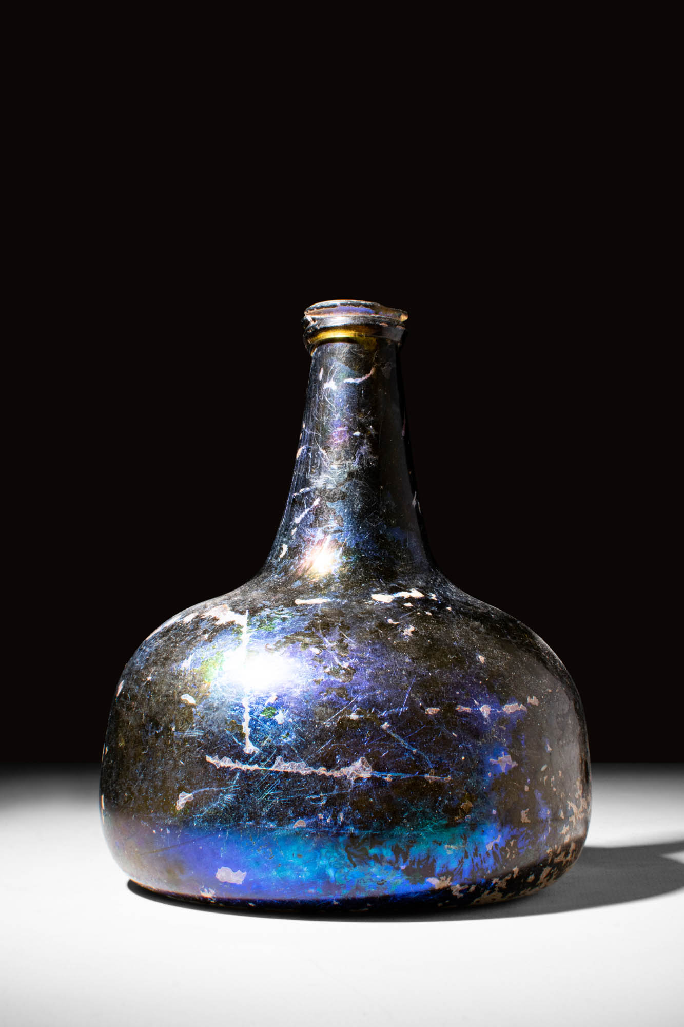 POST MEDIEVAL BLUE GLASS WINE OR RUM BOTTLE