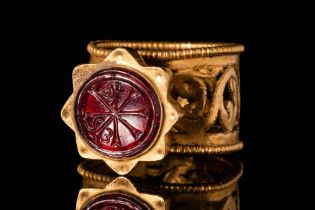 RARE BYZANTINE GOLD FINGER RING WITH CARNELIAN INTAGLIO DEPICTING CHRISMON