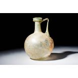 ROMAN GLASS JUG WITH ELEGANT VERTICAL HANDLE