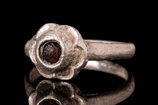 WESTERN EUROPEAN MEDIEVAL SILVER RING WITH RED GLASS CABOCHON