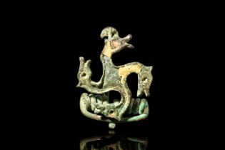 ROMAN BRONZE SWASTIKA BROOCH WITH HORSE HEADS