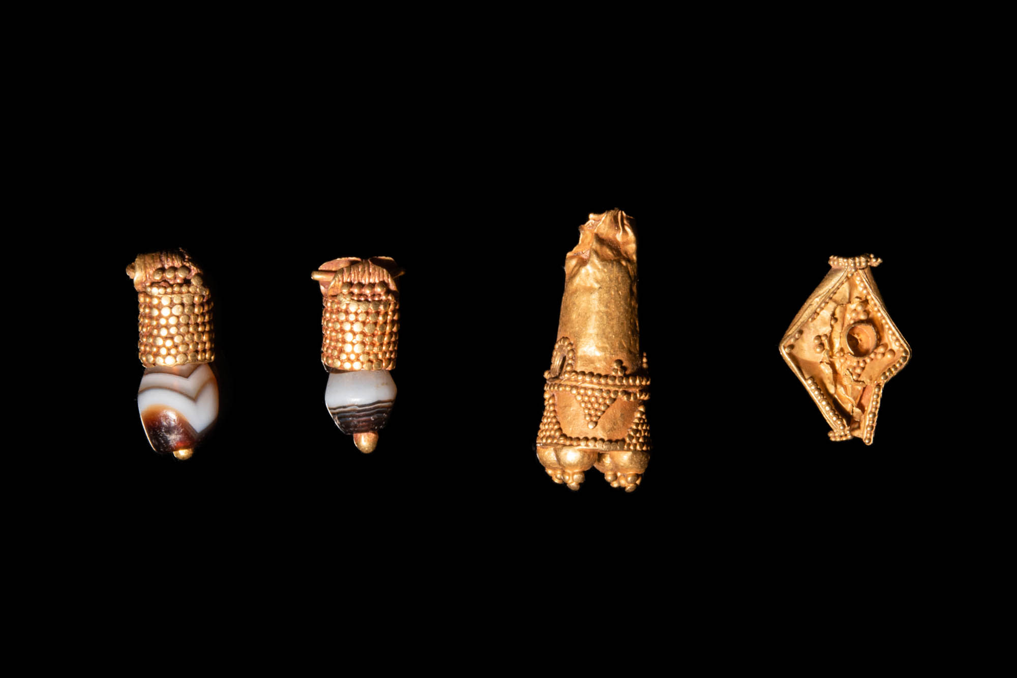 FOUR JAVANESE GOLD EARRINGS