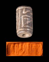 EGYPTIAN BLACK HARD STONE CYLINDER SEAL INSCRIBED