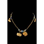 GOLD NECKLACE WITH EGYPTIAN GOLD PENDANTS AND BEADS