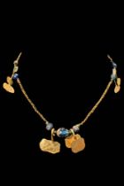 GOLD NECKLACE WITH EGYPTIAN GOLD PENDANTS AND BEADS