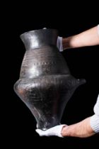 ETRUSCAN BUCCHEROID BICONICAL URN DECORATED WITH GEOMETRIC PATTERNS