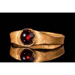 ROMAN GOLD RING WITH GARNET GEM