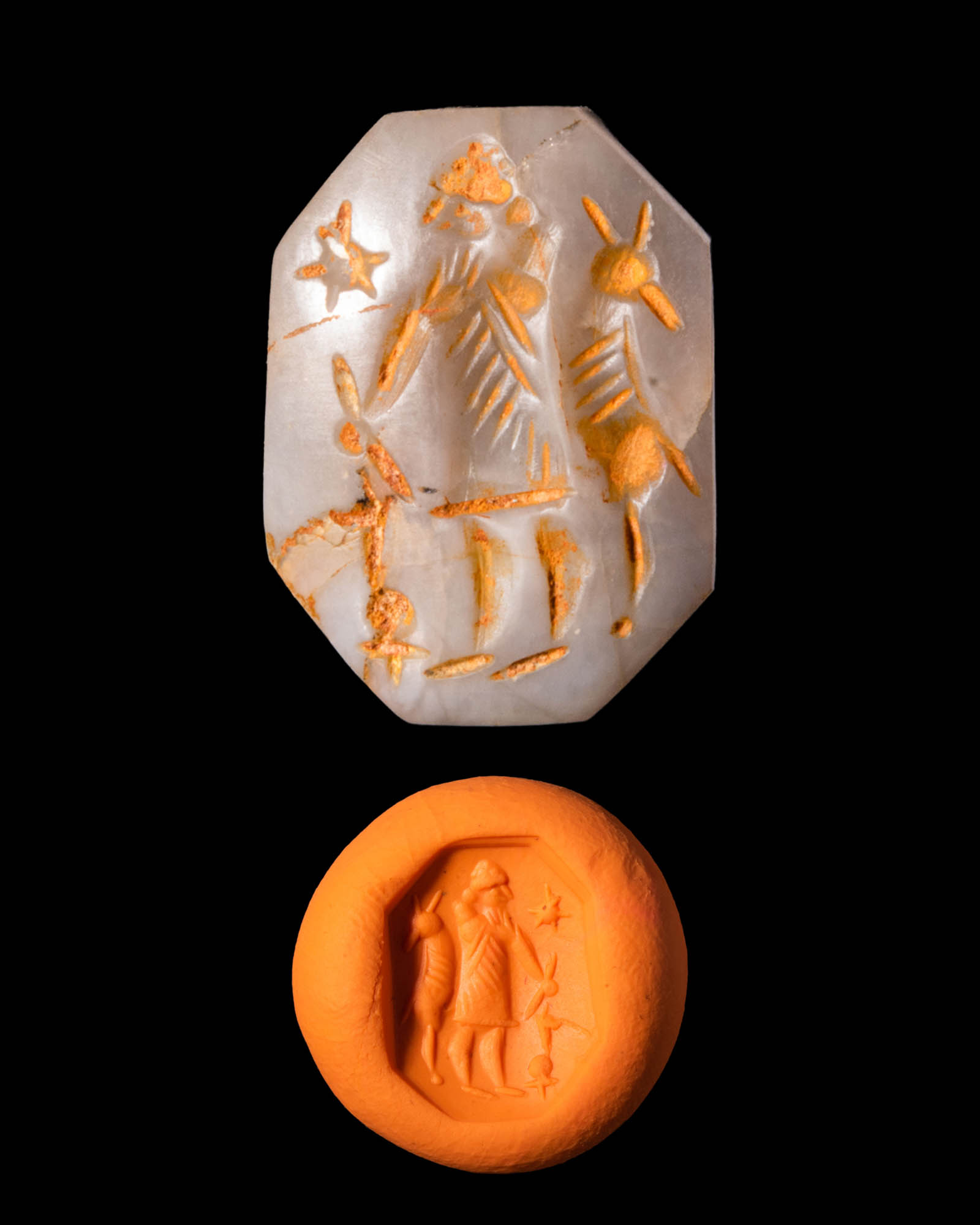 NEO - BABYLONIAN STAMP SEAL DEPICTING A STANDING GOD WITH A HORNED TIARA