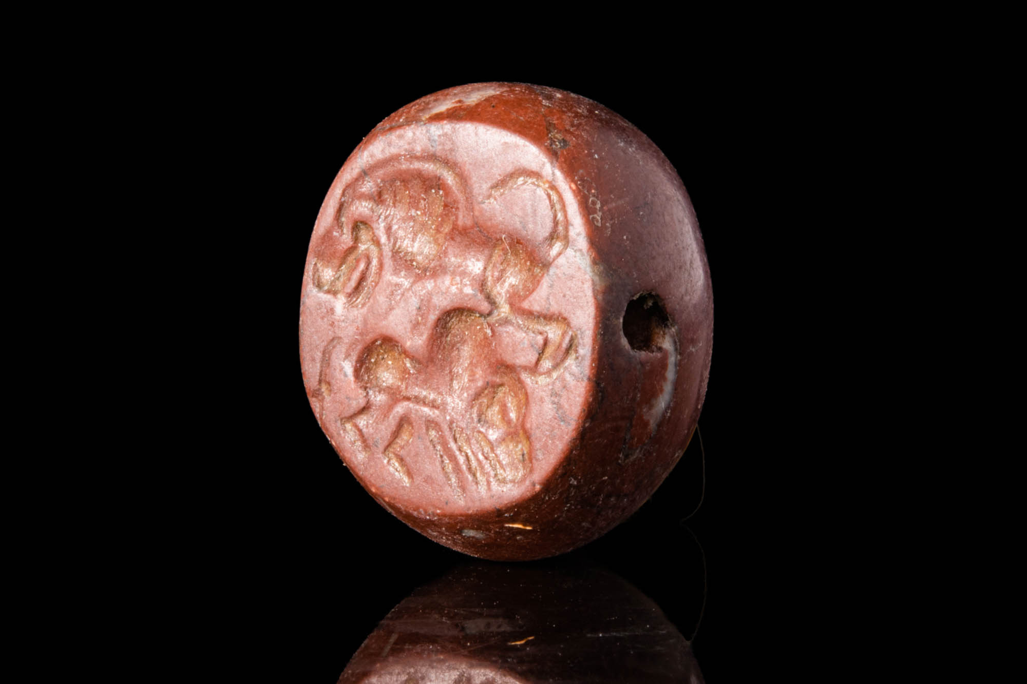 SASANIAN RED JASPER STAMP SEAL OF A LION ATTACKING A ZEBU BULL - Image 2 of 4