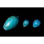 THREE EGYPTIAN TURQUOISE FAIENCE FIG MODELS