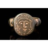 RARE MEDIEVAL BRONZE RING WITH FACE OF A SHIELD FRAME