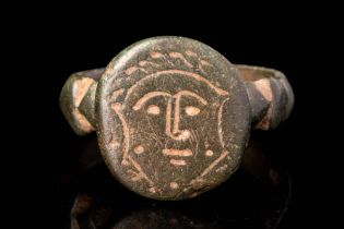 RARE MEDIEVAL BRONZE RING WITH FACE OF A SHIELD FRAME