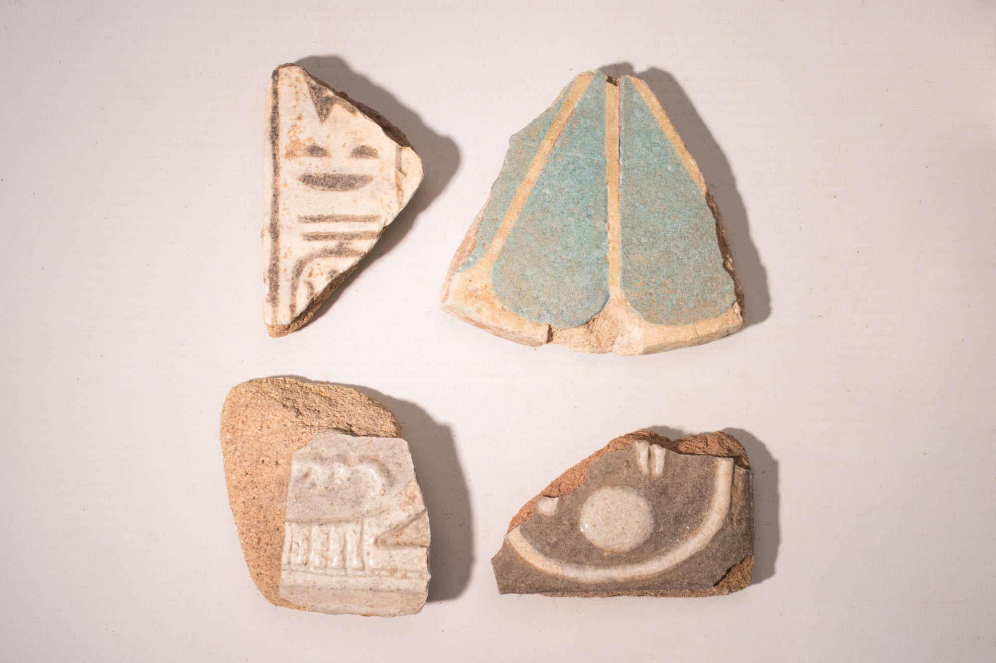 EGYPTIAN BICHROME FAIENCE TILE FRAGMENTS