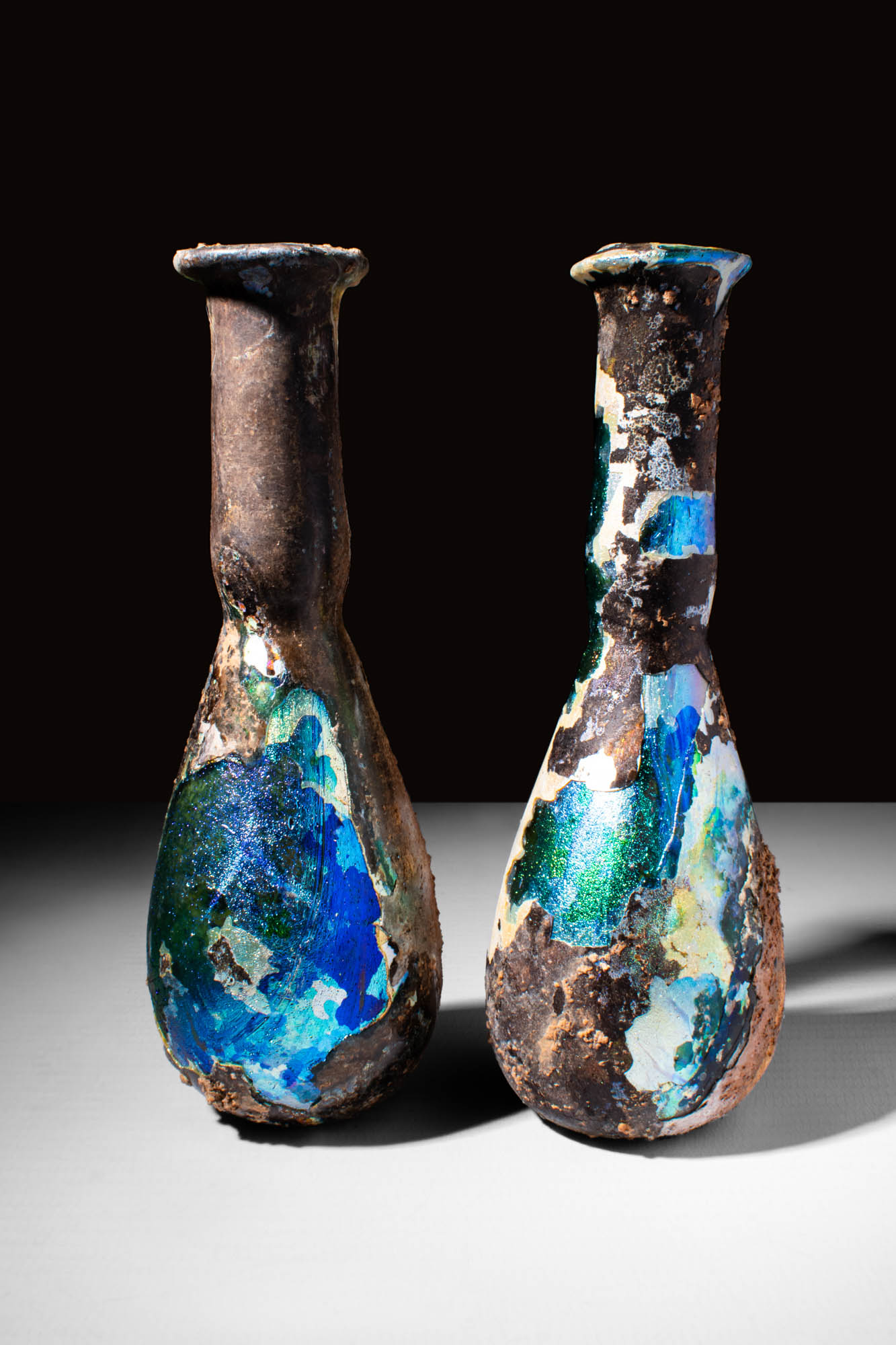 TWO ROMAN GLASS VESSELS WITH SUPERB COLOURS