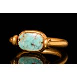 EGYPTIAN GOLD FINGER RING WITH TURQUOISE BEZEL