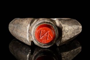 LATE ROMAN SILVER RING WITH INTAGLIO ENGRAVED WITH MONOGRAM