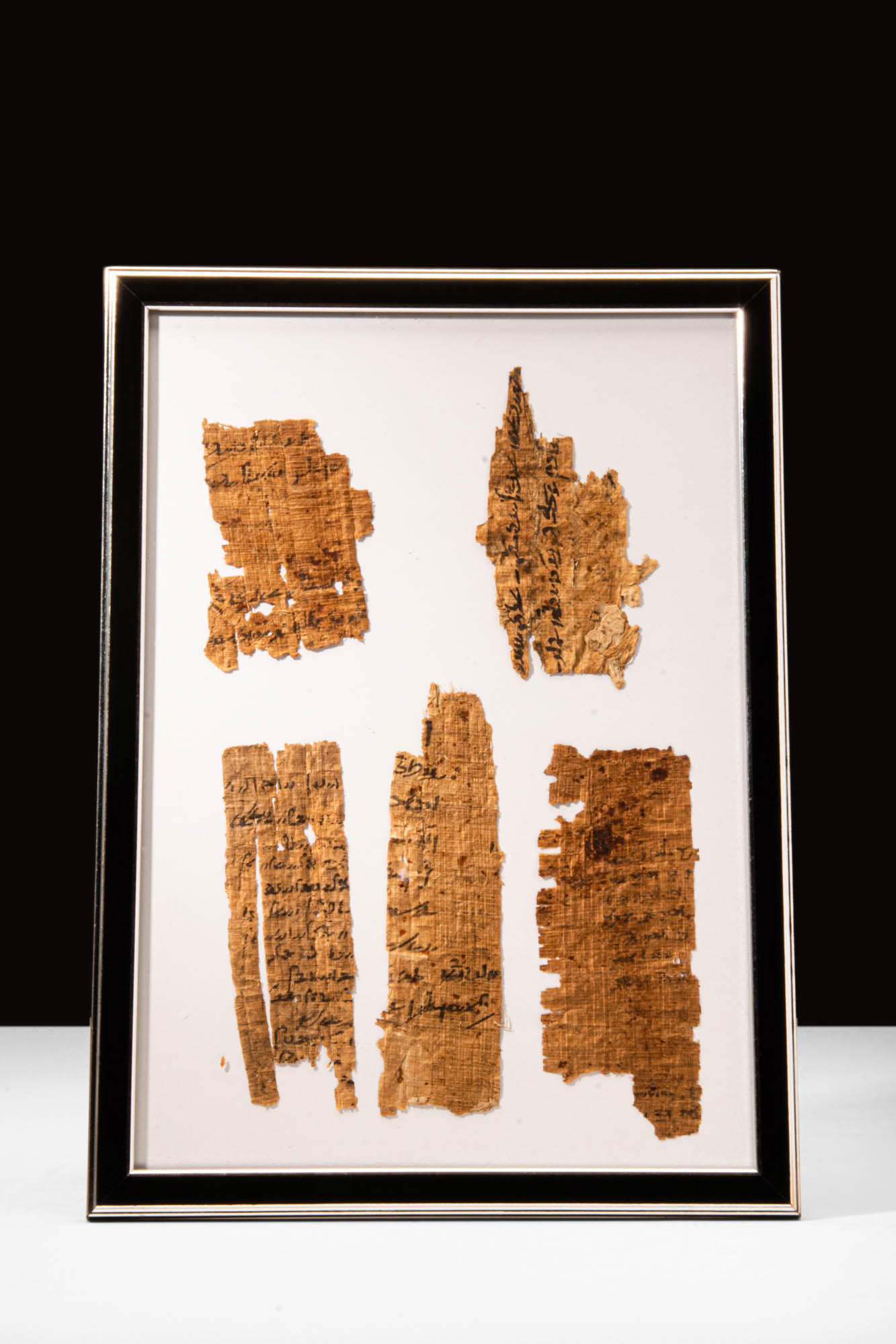 FIVE FRAGMENTS OF PAPYRUS