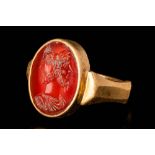 ROMAN CARNELIAN INTAGLIO DEPICTING JANUS IN GOLD RING